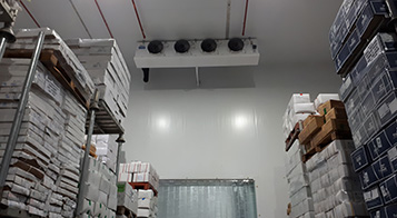 Project name: G2 International LLC, Technopark Dubai<br/>
Refrigeration contractor: Fanar al Khaleej Refrigeration<br/>
Execution: 2017-2018<br/>
Application: Logistic cold store, dry cold store, chiller and freezer cold rooms<br/>
Application with hot gas defrost + electrical in parallel<br/>
Cooling system description:<br/>
- Chilled receiving area: LU-VE Cubic 2# F50HC 1806 E 7 - 40,6kW  (10C_85%_EV-3) R404a<br/>
- 7 cold stores dual application Chiller/Freezer (various sizes): LU-VE Cubic 15# F50HC 1808 E 7 - 21,4kW (-20C_85%_EV-27C) R404a<br/>
- 2 cold stores dual application Chiller/Freezer (various sizes): LU-VE Cubic 4# F50HC 1806 E 7 - 17,4kW (-20C_85%_EV-27C) R404a<br/>
- 1 cold stores dual application Chiller/Freezer (various sizes): LU-VE Cubic 1# F45HC 1320 E 7 - 30,3kW (-20C_85%_EV-27C) R404a<br/>
- Corridor: LU-VE Cubic 2# F50HC 1706 E 6 - 40,6kW  (5_85%_EV-3) R404a<br/>
- Dry storage area (1800sqm): LU-VE Cubic 3# F71HC 4208 N 6 – 65,8kW (22C_65%_EV-27C) R134a<br/>
- Technical Store: LU-VE Cubic 1# F45HC 1112 N 4 – 28,9kW (22C_65%_EV-27C) R134a<br/>
- Plant room: LU-VE Cubic 1# F35HC 261 N 6 – 19,4kW (25C_65%_EV-27C) R134a<br/>
Rack System:<br/>
- 1# Profroid 200HP Rack for LT application R404a<br/>
- 1# Profroid 120HP Rack for MT application R134a
